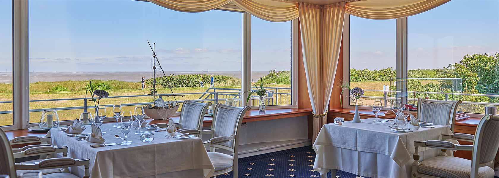 Sterne-Restaurant Sterneck mit Blick auf die Strandpromenade